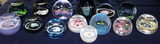 Fourteen various glass paperweights including some Caithness